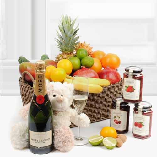 Relaxed With Fruit Basket And Champagne-Best Gifts For Expecting Parents